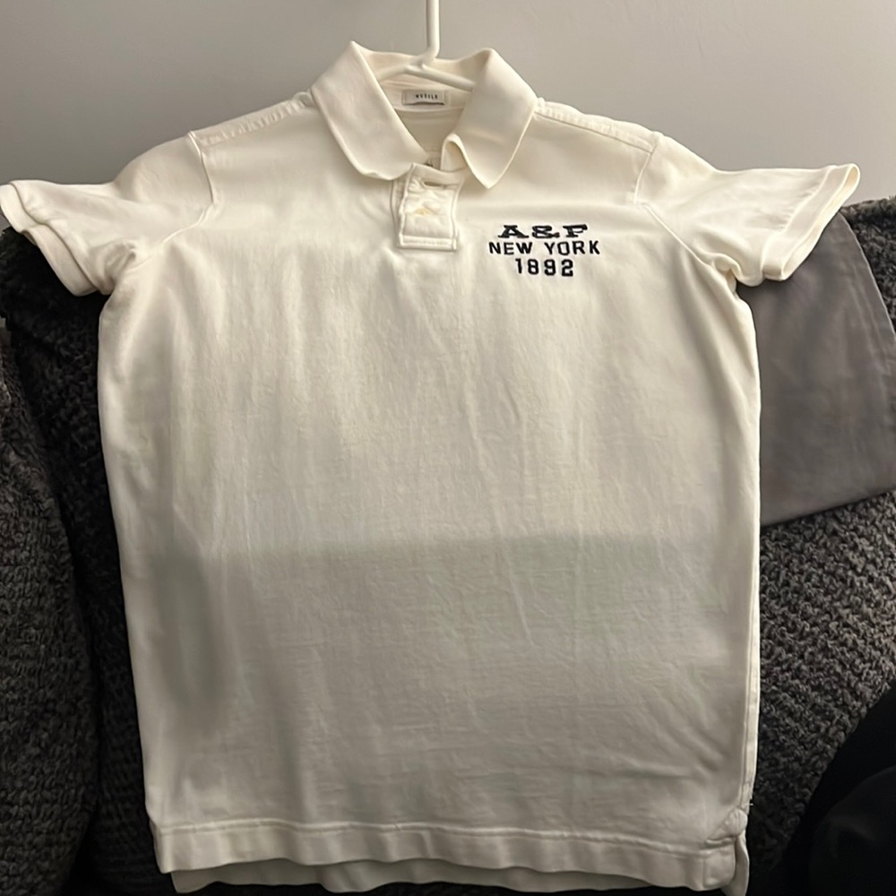 White Polo shirt .